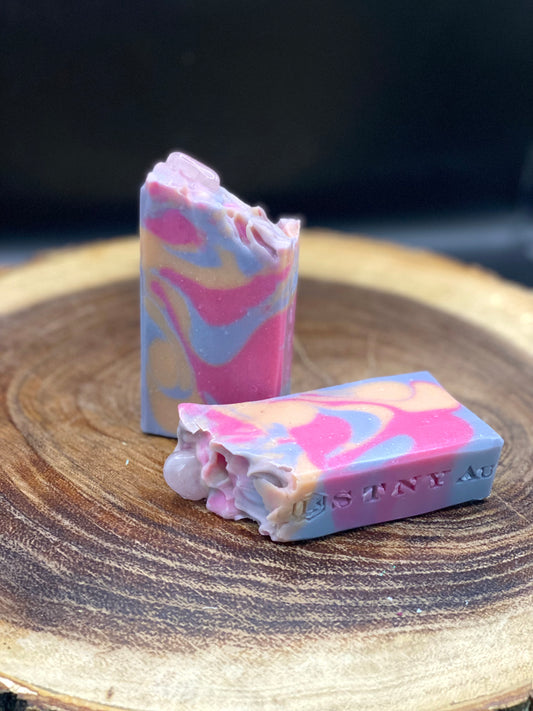 Organic Handmade Cold Process Soap. Colored with Pink, Grey and Tan designs. Topped with a Rose Quartz Gemstone.